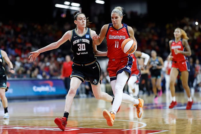 Washington Mystics forward Elena Delle Donne dribbles past New York Liberty forward Breanna Stewart.